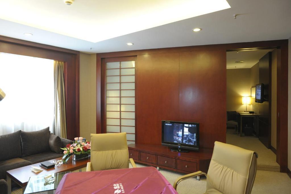 Wuhan Junyi Dynasty Hotel Værelse billede